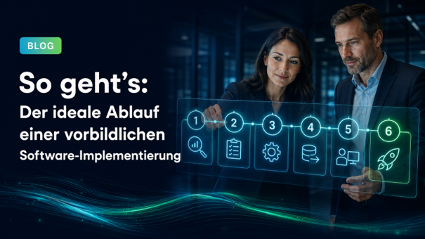 Frau und Mann im Unternehmen am Computer: Wenn Sie einen Software-Rollout planen, sollte dieser eine gute Betreuung der User beinhalten.